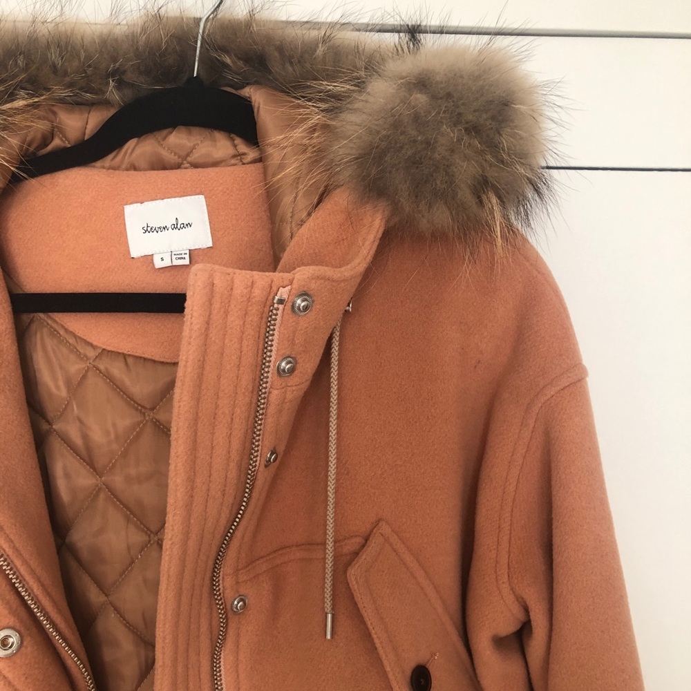 Steven Alan tan/peachy wool coat with a fur trim.